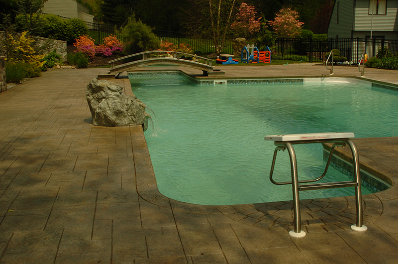Swimming pool and stamped concrete project example 122